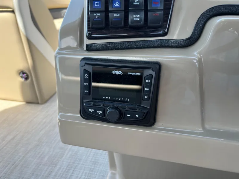 Slide: The Image of Control panel of 2025 Starcraft SLS 3 Q DH boat with audio system. - 13