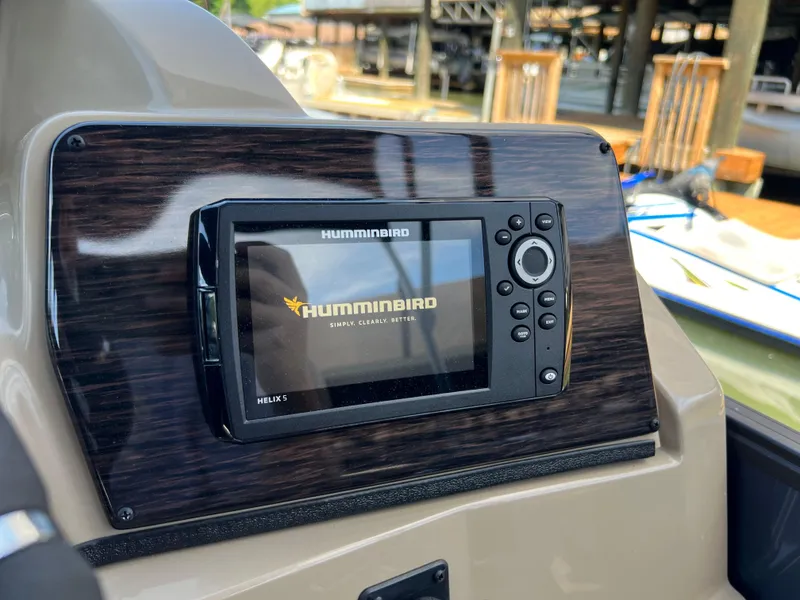 Slide: The Image of Humminbird Helix 5 fish finder on 2025 Starcraft SLS 3 Q DH boat dashboard. - 14