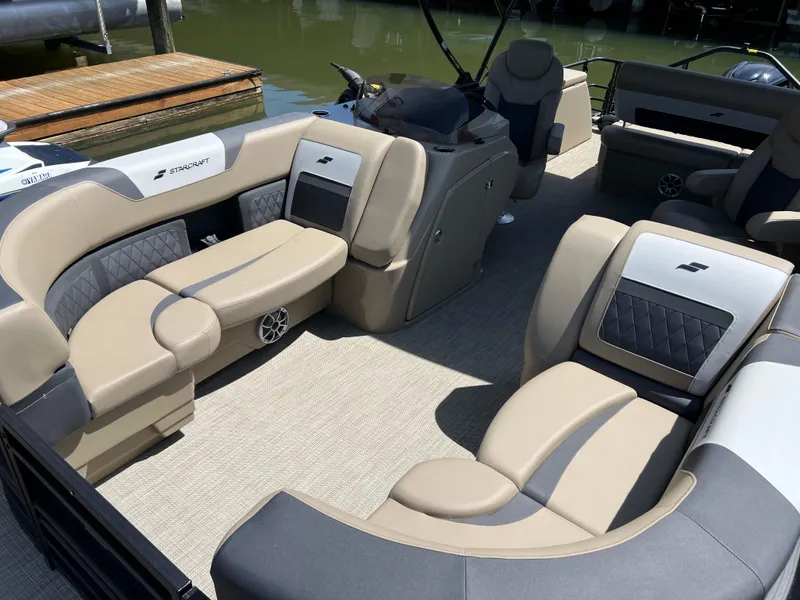 Slide: The Image of 2025 Starcraft SLS 3 Q DH boat interior with luxurious seating and modern design. - 2