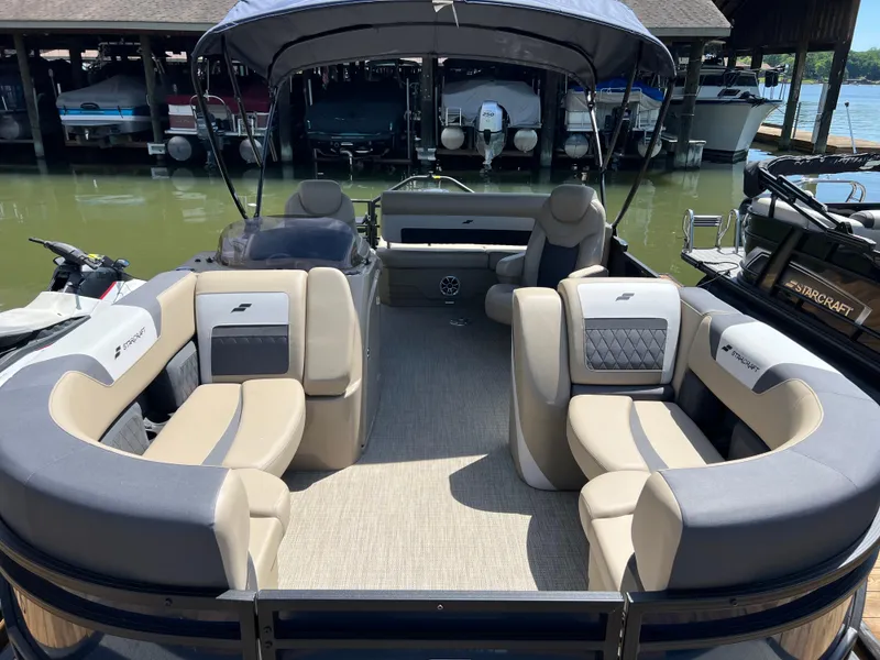 Slide: The Image of 2025 Starcraft SLS 3 Q DH pontoon boat with spacious seating and elegant design. - 3