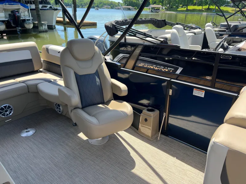 Slide: The Image of Luxurious 2025 Starcraft SLS 3 Q DH boat interior with comfortable seating and elegant design. - 7