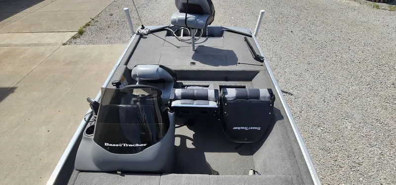Slide: The Image of 2008 Tracker Pro Team 170 TX fishing boat interior with seating and console. - 12