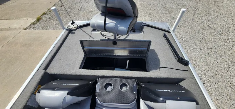 Slide: The Image of 2008 Tracker Pro Team 170 TX boat interior with seating and storage compartments. - 15