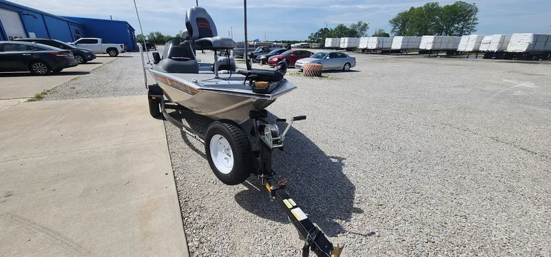 Slide: The Image of 2008 Tracker Pro Team 170 TX boat on trailer in parking lot. - 4