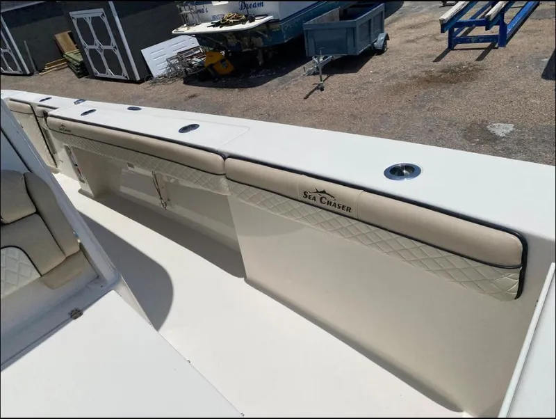Slide: The Image of 2020 Sea Chaser 35 HFC CC boat interior with seating and storage compartments. - 11