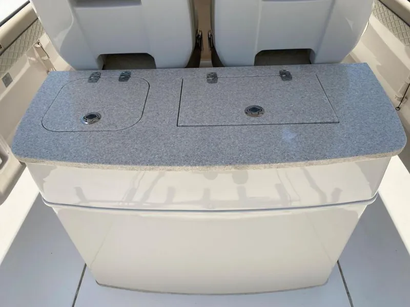 Slide: The Image of 2020 Sea Chaser 35 HFC CC boat console with dual storage compartments. - 13