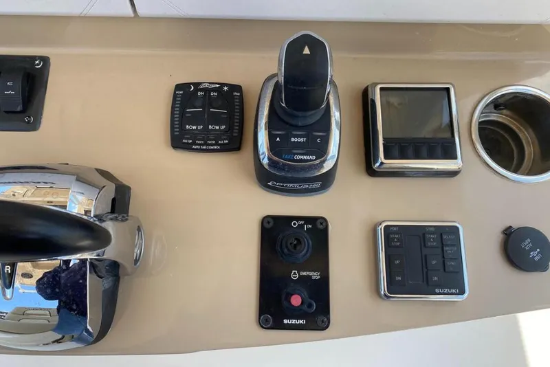 Slide: The Image of Control panel of 2020 Sea Chaser 35 HFC CC boat with various switches and displays. - 18