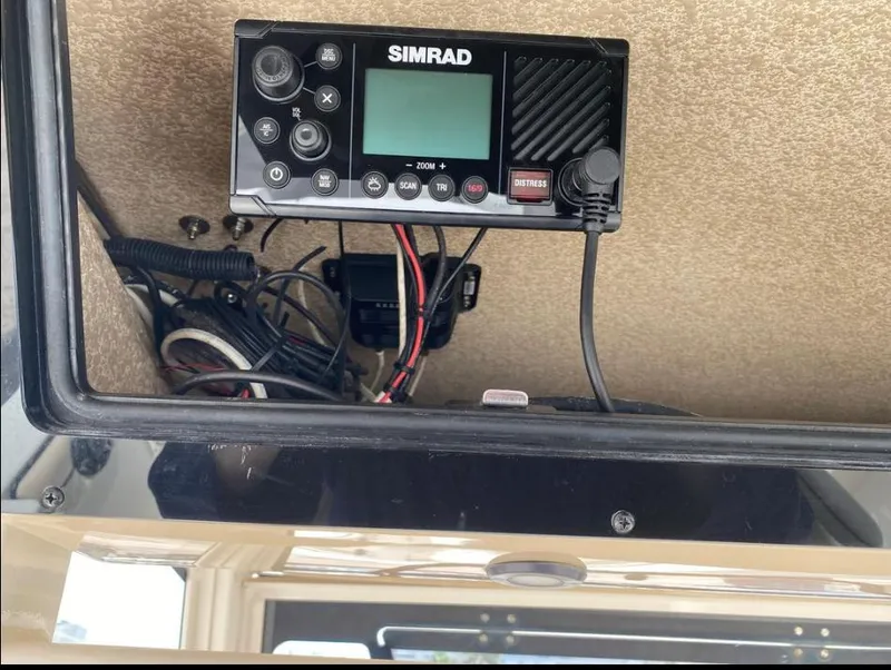 Slide: The Image of Simrad marine radio installed on 2020 Sea Chaser 35 HFC CC boat dashboard. - 20