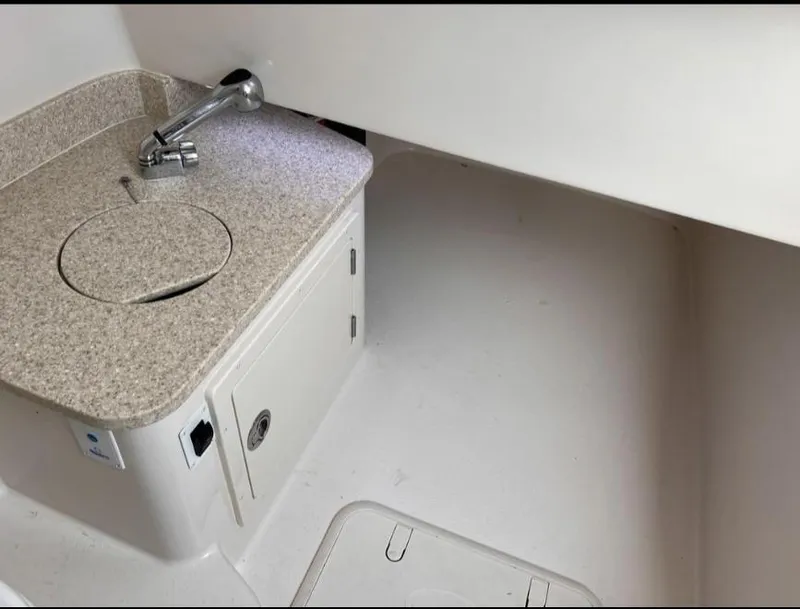 Slide: The Image of 2020 Sea Chaser 35 HFC CC boat interior with compact sink and storage. - 22