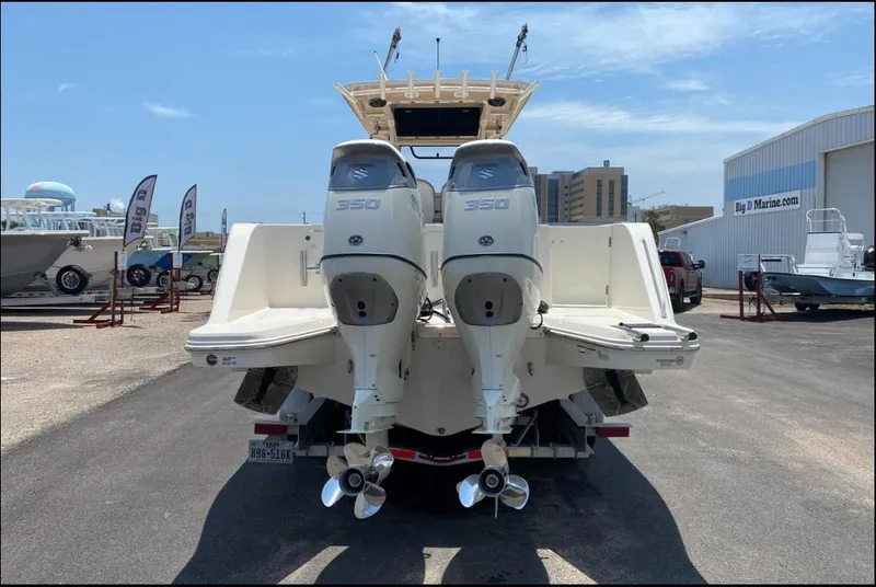 Slide: The Image of 2020 Sea Chaser 35 HFC CC boat with twin 350 engines at a marina. - 6