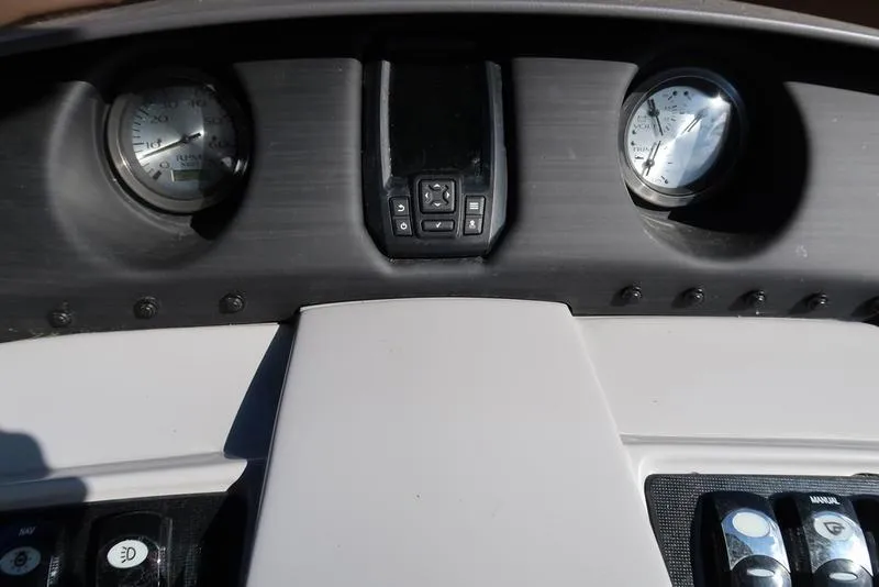 Slide: The Image of Dashboard of 2021 Bennington 24 RTFB boat with gauges and controls. - 17