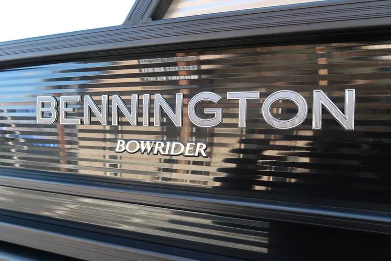 Slide: The Image of 2021 Bennington 24 RTFB Bowrider logo on sleek black surface. - 37