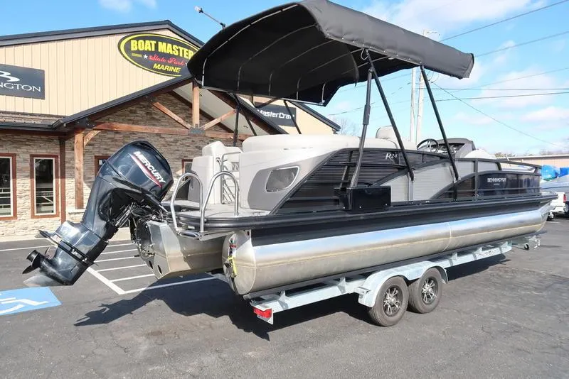 Slide: The Image of 2021 Bennington 24 RTFB pontoon boat on trailer, parked outside Boat Masters Marine. - 44