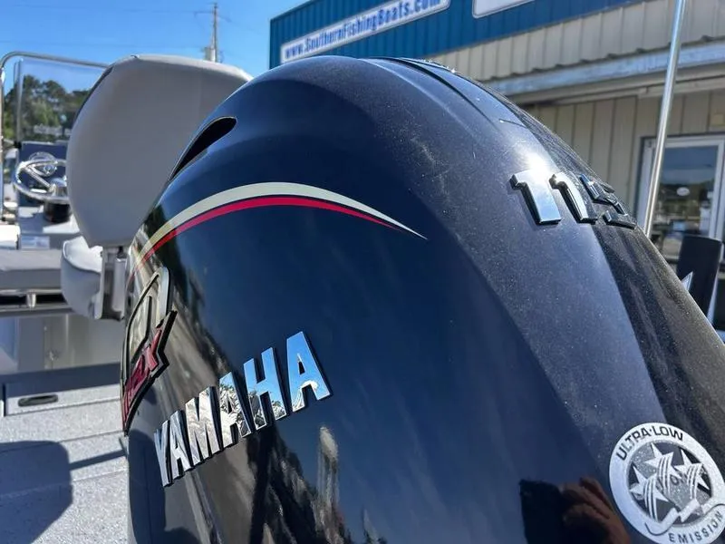 Slide: The Image of Yamaha outboard motor on 2025 Xpress H20B boat, Southern Fishing Boats dealership background. - 13