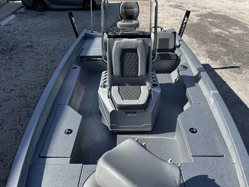 Slide: The Image of 2025 Xpress H20B boat interior with gray seating and modern design. - 8