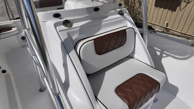Slide: The Image of 2025 ALK2 22CRX boat seat with white and brown leather upholstery, featuring diamond stitching. - 16
