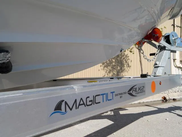 Slide: The Image of Boat trailer with Magic Tilt branding, distributed by ALK2, model 17HS, year 2025. - 19