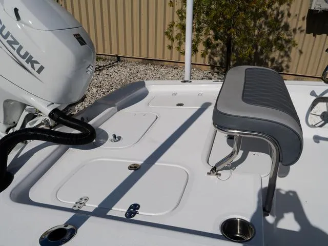 Slide: The Image of Boat deck with Suzuki engine, ALK2 17HS model, 2025, featuring seating and storage compartments. - 4