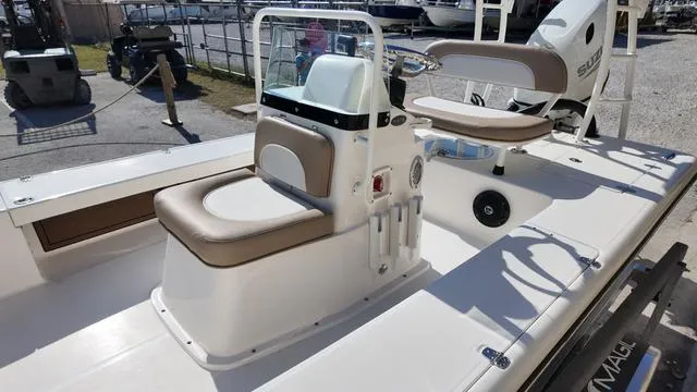 Slide: The Image of 2025 Spyder Boats FX19 Vapor with beige seating and sleek design. - 14
