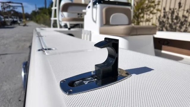 Slide: The Image of 2025 Spyder Boats FX19 Vapor deck with rod holder, showcasing sleek design and functionality. - 18