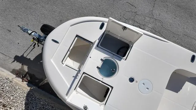 Slide: The Image of 2025 Spyder Boats FX19 Vapor, top view showing deck layout and storage compartments. - 27