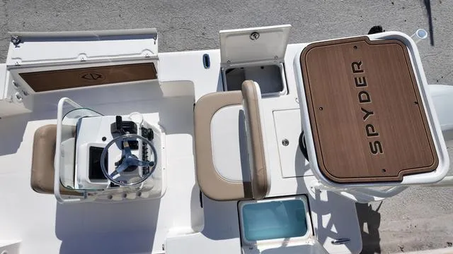 Slide: The Image of 2025 Spyder Boats FX19 Vapor interior with steering console and seating, top view. - 29