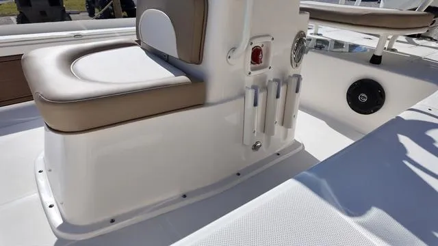 Slide: The Image of 2025 Spyder Boats FX19 Vapor interior with cushioned seating and rod holders. - 33