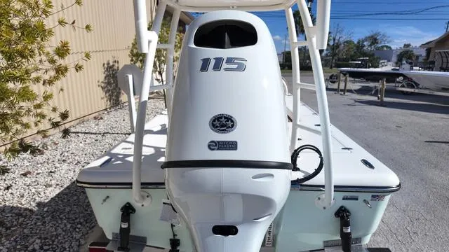 Slide: The Image of 2025 Spyder Boats FX19 Vapor with 115 horsepower engine, rear view. - 7