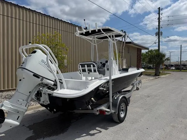 Slide: The Image of 2025 ALK2 22CRS boat with GPS and stereo, parked outdoors on a trailer. - 10