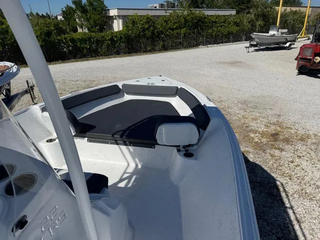 Slide: The Image of 2025 ALK2 22CRS boat with GPS and stereo, parked on gravel lot. - 6