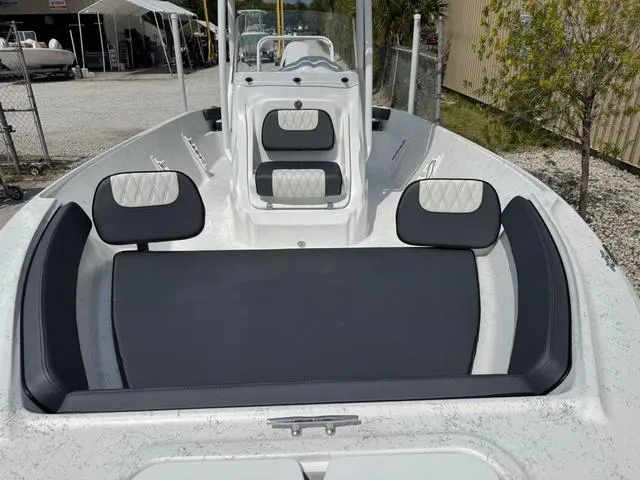 Slide: The Image of 2025 ALK2 22CRS boat interior with cushioned seating and modern design. - 9