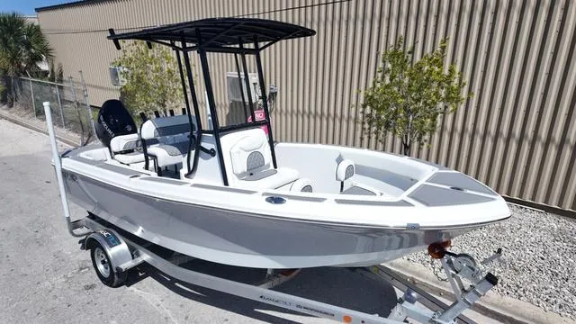 Slide: The Image of 2025 Polar 195 CC boat on trailer, featuring sleek design and modern amenities. - 1
