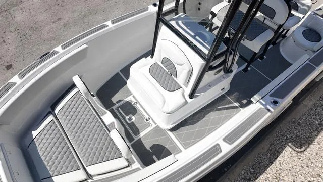 Slide: The Image of 2025 Polar 195 CC boat interior with cushioned seating and modern design. - 11