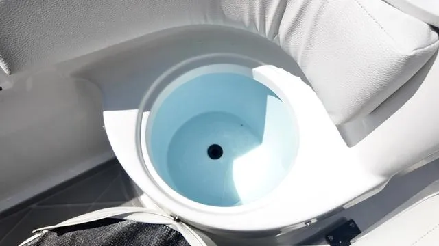 Slide: The Image of Cup holder in 2025 Polar 195 CC boat, featuring white interior design. - 19
