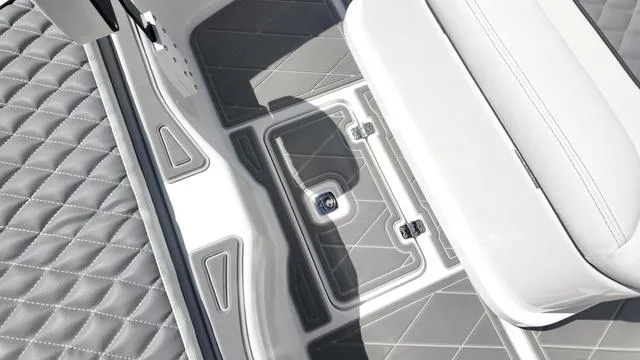 Slide: The Image of Interior view of 2025 Polar 195 CC boat, featuring quilted seating and sleek flooring design. - 30