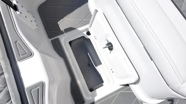 Slide: The Image of Interior view of 2025 Polar 195 CC boat, featuring storage compartment and seating. - 31