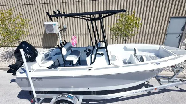 Slide: The Image of 2025 Polar 195 CC boat on trailer, featuring sleek design and modern seating. - 35