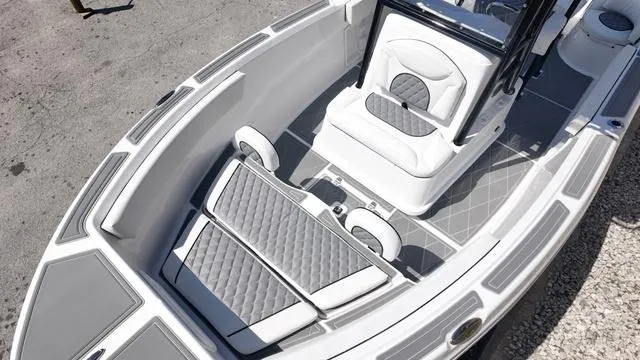 Slide: The Image of 2025 Polar 195 CC boat interior with cushioned seating and sleek design. - 40