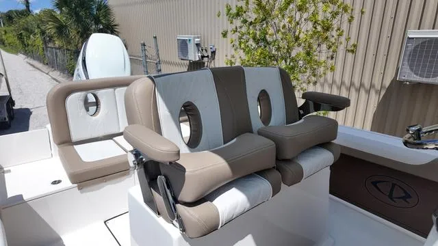 Slide: The Image of 2026 Sea Born LX22 Center Console on trailer outdoors. - 4