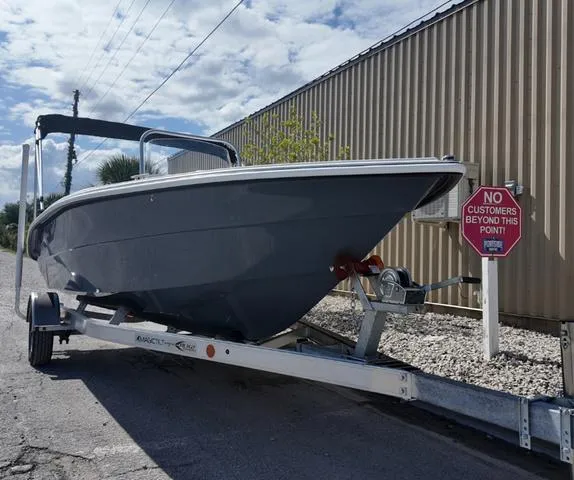 Slide: The Image of 2025 ALK2 18CRS boat on trailer near "No Customers Beyond This Point" sign. - 17