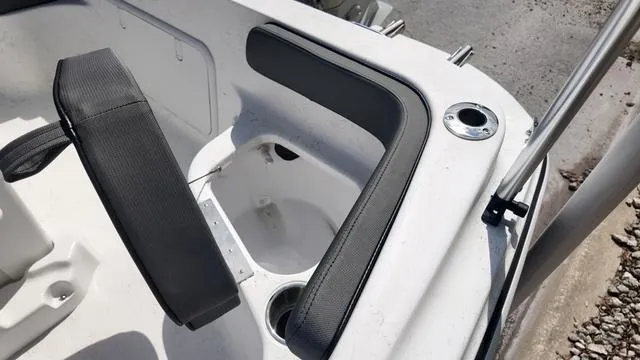 Slide: The Image of 2025 ALK2 18CRS boat interior with seating and storage compartment. - 39