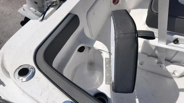 Slide: The Image of 2025 ALK2 18CRS boat interior with open storage compartment and seating. - 41