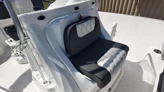 Slide: The Image of 2025 ALK2 18CRS boat seat with black and white cushioned design. - 42