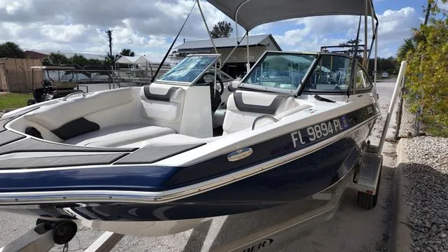 Slide: The Image of 2013 Yamaha Boats SX192 with canopy, parked on trailer, ready for adventure. - 14