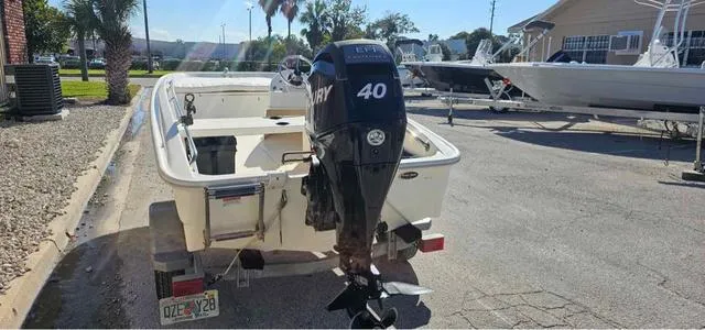 Slide: The Image of 2012 Boston Whaler SPORT 130 boat with Mercury 40 engine on trailer. - 2