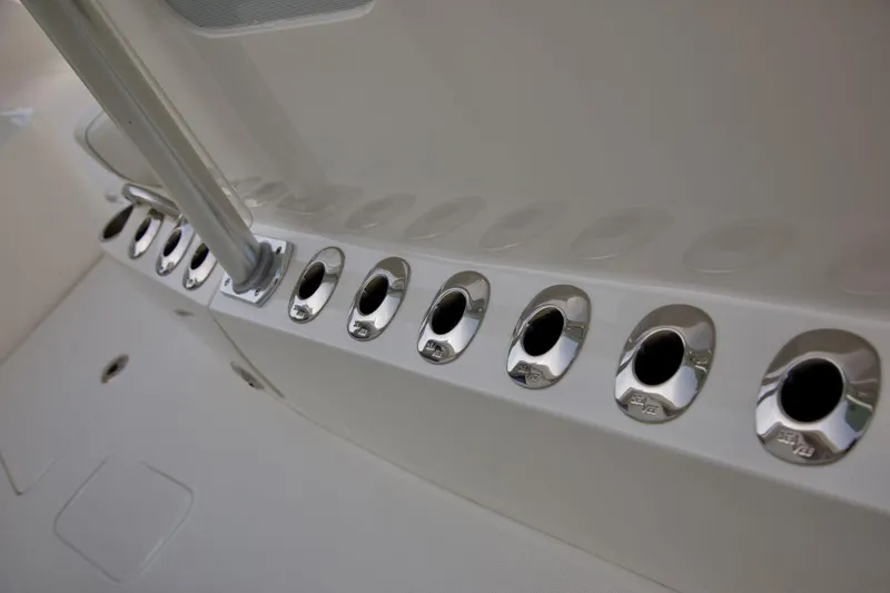 Slide: The Image of 2024 SeaVee 390Z boat deck with multiple rod holders. - 10