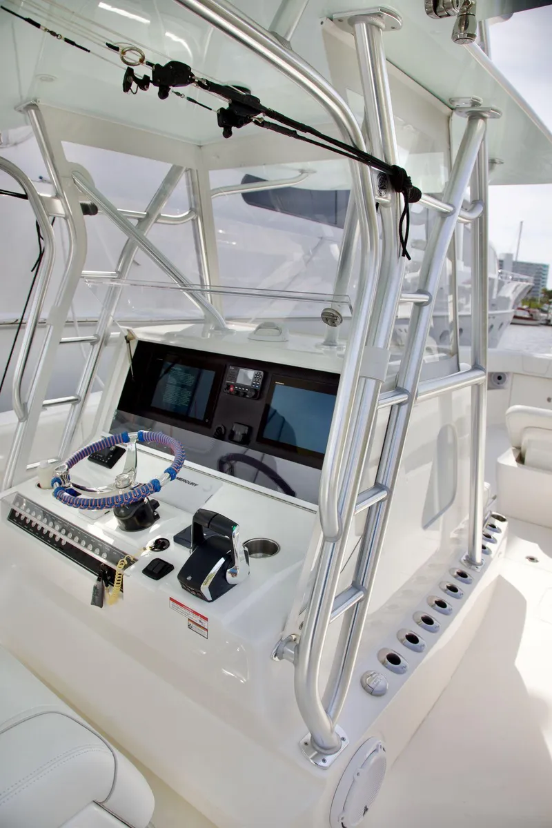 Slide: The Image of 2024 SeaVee 390Z boat console with advanced navigation and control systems. - 7