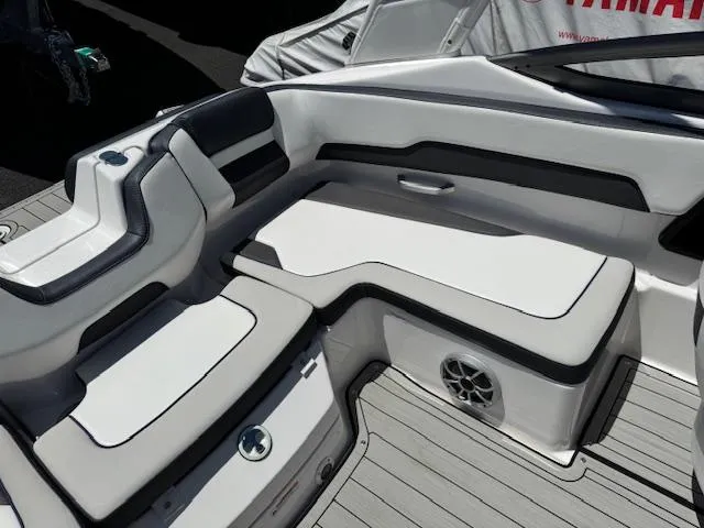 Slide: The Image of 2021 Yamaha Boats 195S interior seating with sleek design and modern upholstery. - 15