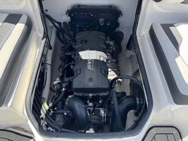 Slide: The Image of 2021 Yamaha Boats 195S engine compartment, showcasing a powerful and compact marine engine. - 19