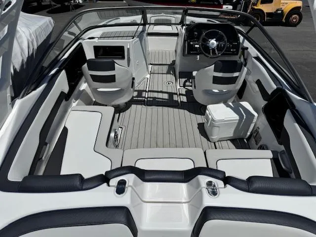 Slide: The Image of 2021 Yamaha Boats 195S interior with sleek seating and modern dashboard design. - 21
